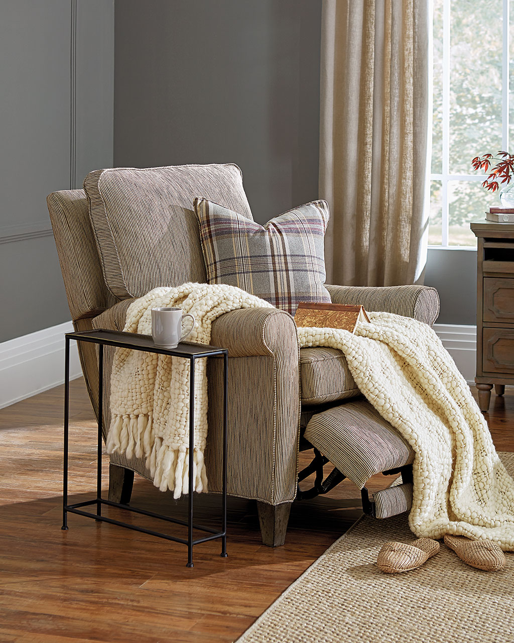 Carve out another room with a reading chair and side table