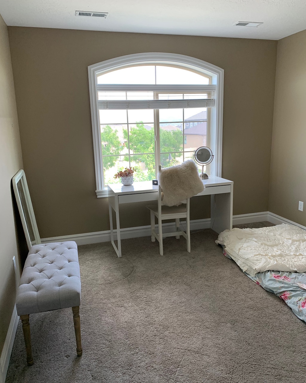 Chloe's extra room with desk and large window