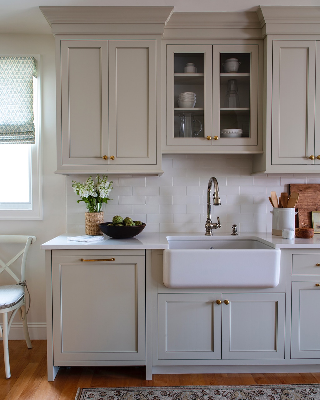 Classic Boston kitchen with farmhouse sink, designed by Lindsay Atapattu