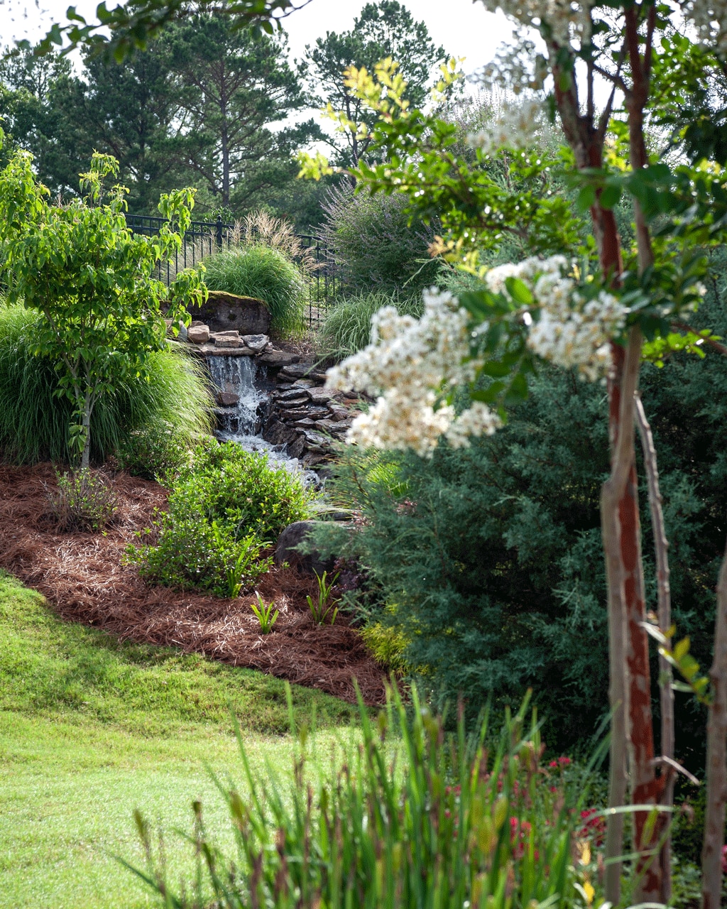 Waterfall design in backyard by Brantley Snipes