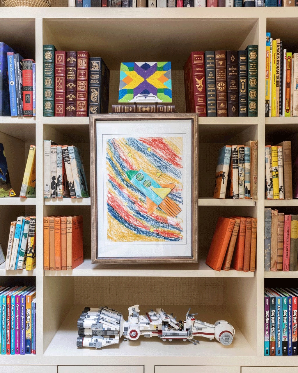 Decorating kid bookshelves by Designer Pebbles Nix