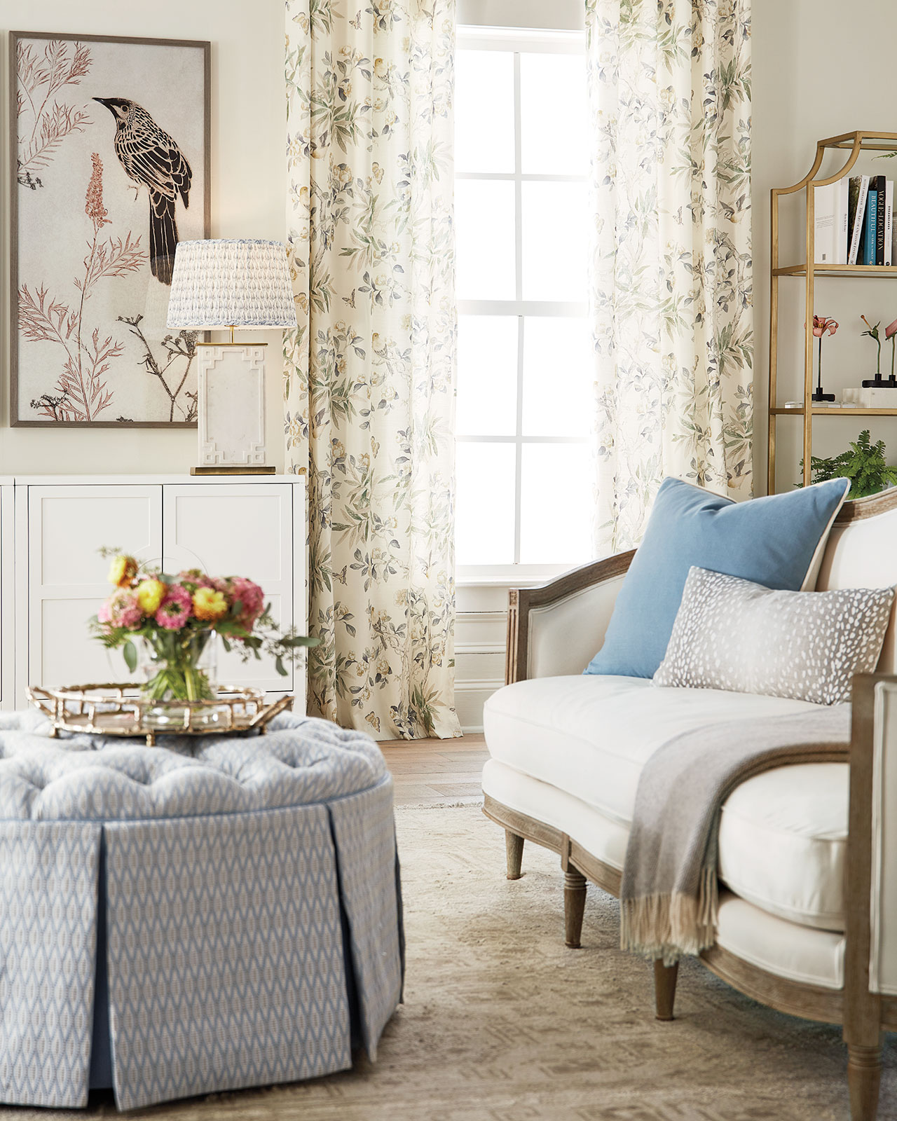 Living room with antique styles and blue and white color palette