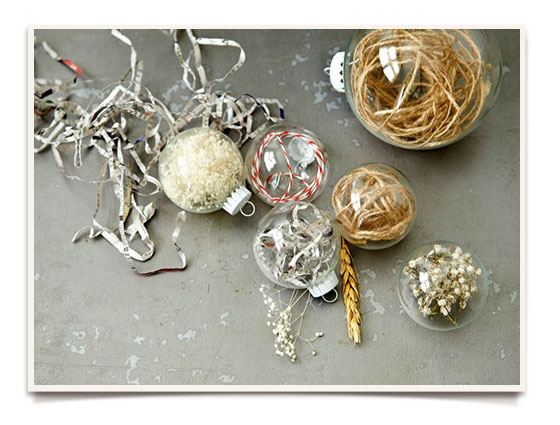 Filled glass ornaments